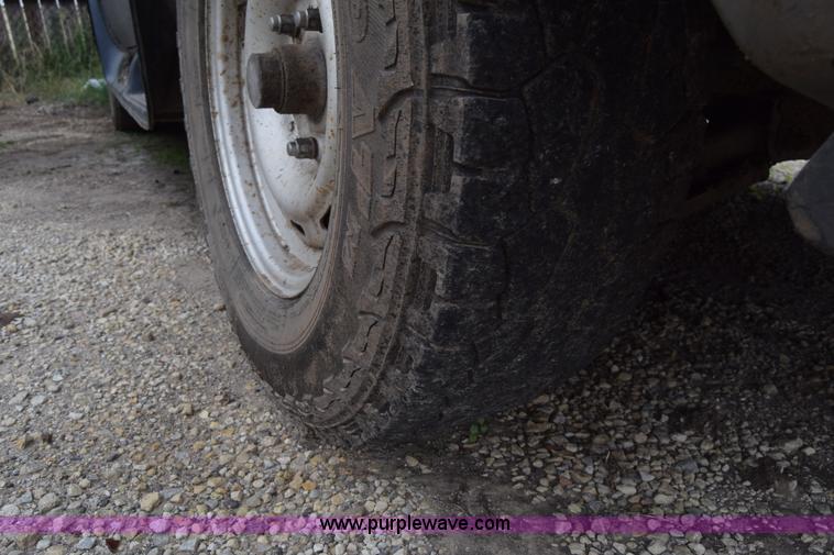 image for item L2573 1999 Dodge Ram 1500 Quad Cab pickup truck