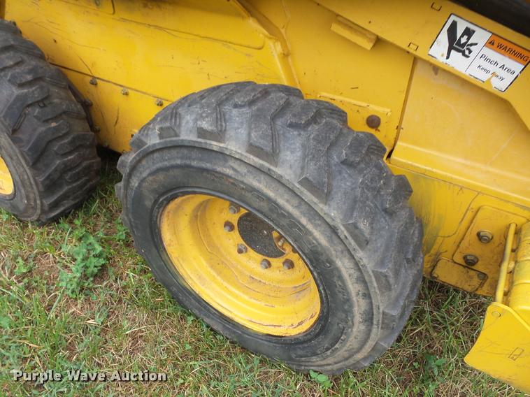 image for item BK9624 1999 John Deere 240 skid steer