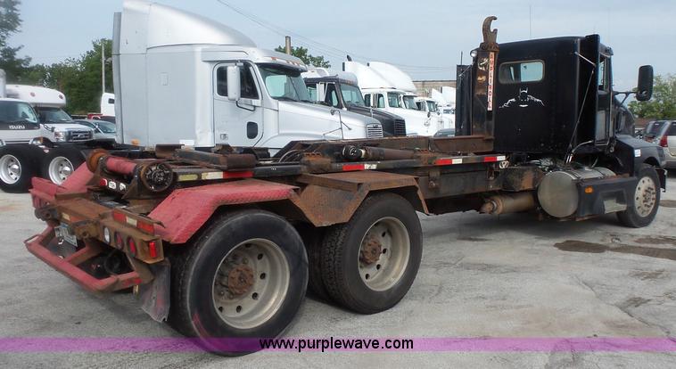 image for item L3516 1994 Kenworth T600 roll-off truck