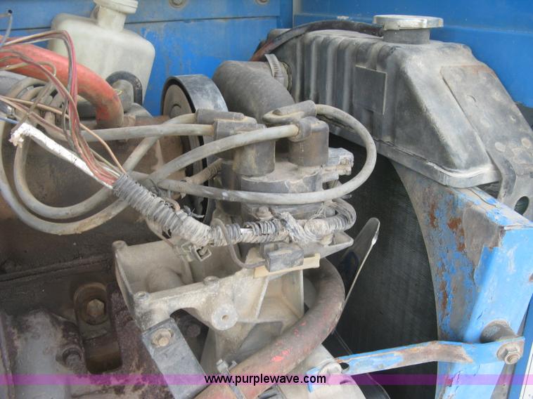 image for item L3842 1998 Genie S-80 boom lift