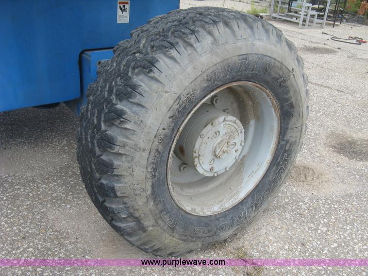 image for item L3842 1998 Genie S-80 boom lift