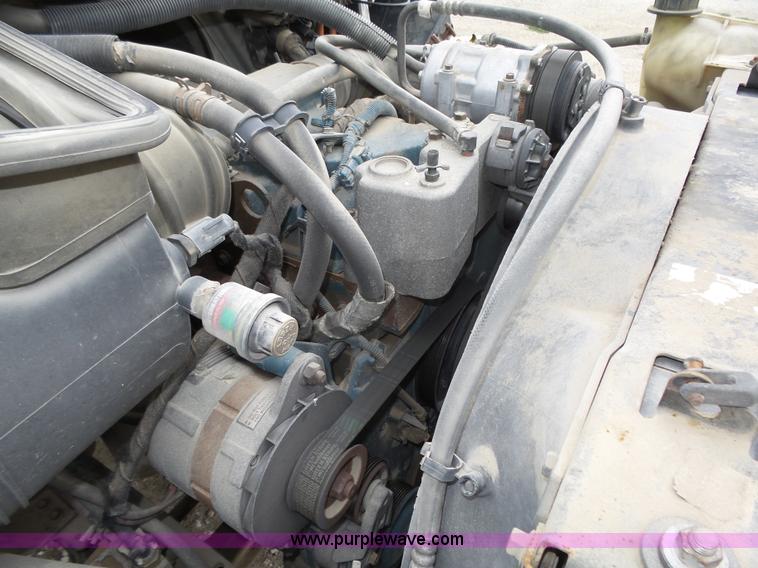 image for item L4004 2003 International DuraStar 4300 pothole patching truck