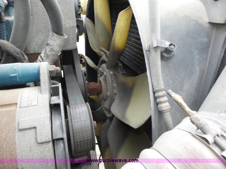 image for item L4004 2003 International DuraStar 4300 pothole patching truck