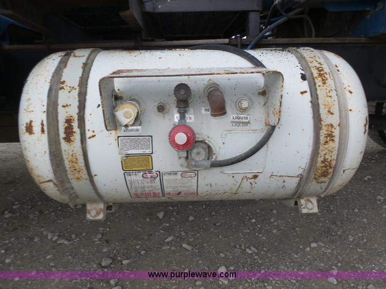 image for item L4004 2003 International DuraStar 4300 pothole patching truck