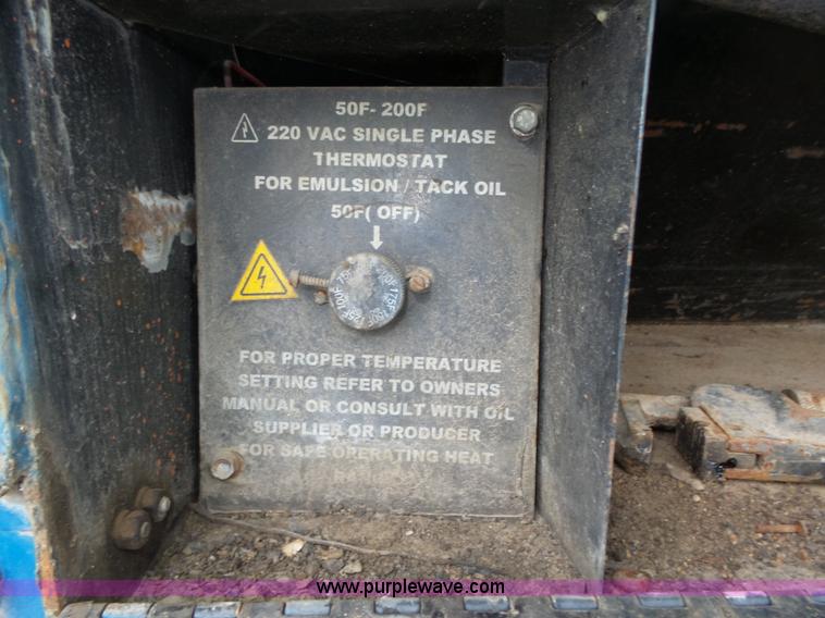 image for item L4004 2003 International DuraStar 4300 pothole patching truck