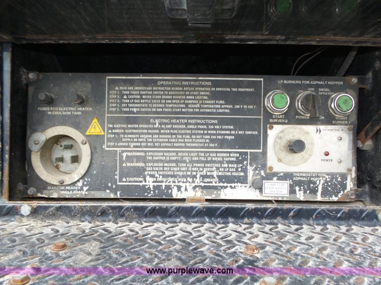 image for item L4004 2003 International DuraStar 4300 pothole patching truck