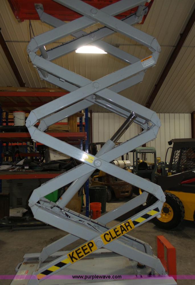 image for item L4038 2004 Sky Jack SJIII 3219 scissor lift