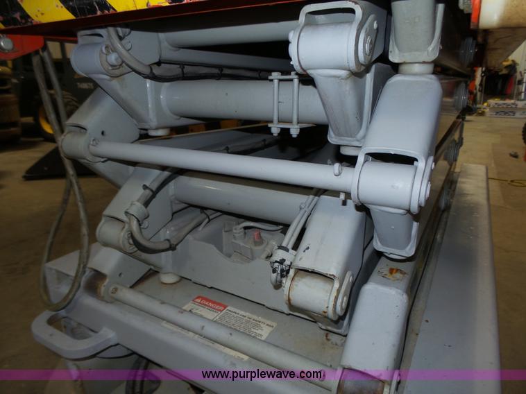 image for item L4038 2004 Sky Jack SJIII 3219 scissor lift