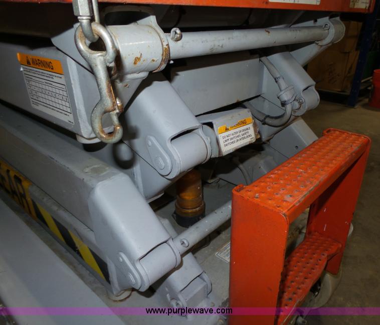 image for item L4038 2004 Sky Jack SJIII 3219 scissor lift