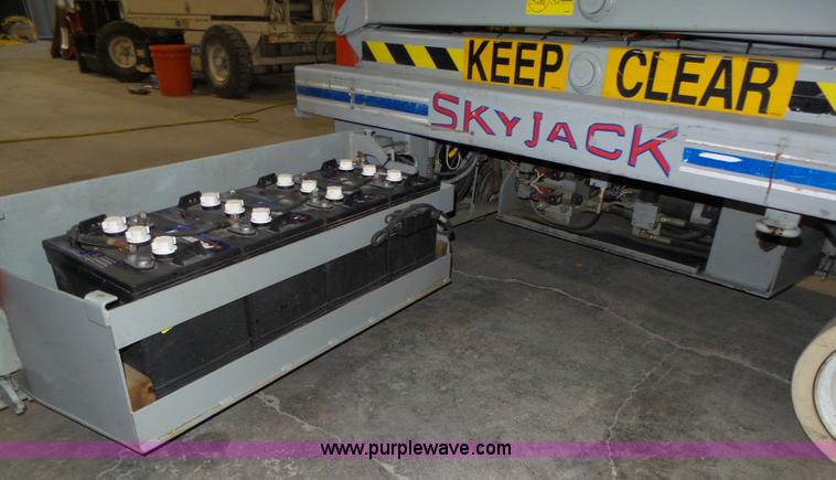 image for item L4038 2004 Sky Jack SJIII 3219 scissor lift
