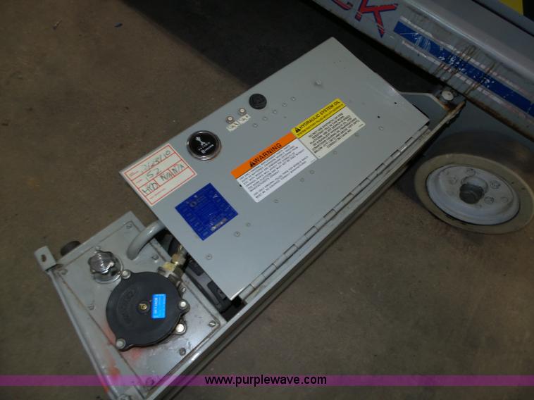 image for item L4038 2004 Sky Jack SJIII 3219 scissor lift