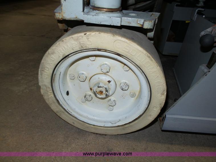 image for item L4038 2004 Sky Jack SJIII 3219 scissor lift