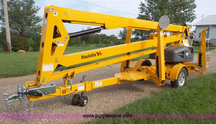 image for item L4983 2015 Haulotte 5533A towable boom lift