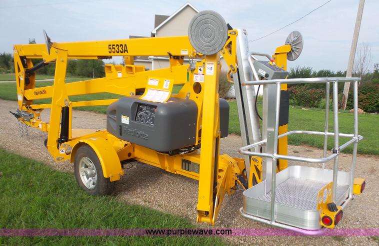 image for item L4983 2015 Haulotte 5533A towable boom lift