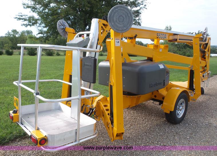 image for item L4983 2015 Haulotte 5533A towable boom lift