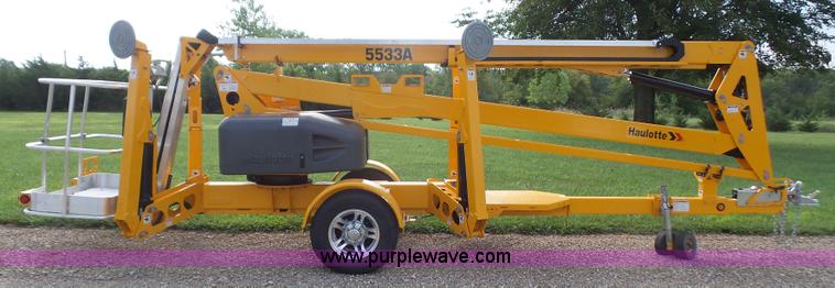 image for item L4983 2015 Haulotte 5533A towable boom lift