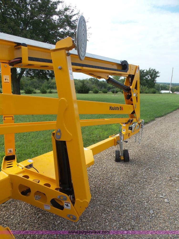 image for item L4983 2015 Haulotte 5533A towable boom lift