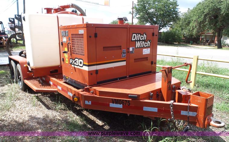 image for item L6613 2014 Ditch Witch FX30 vacuum trailer