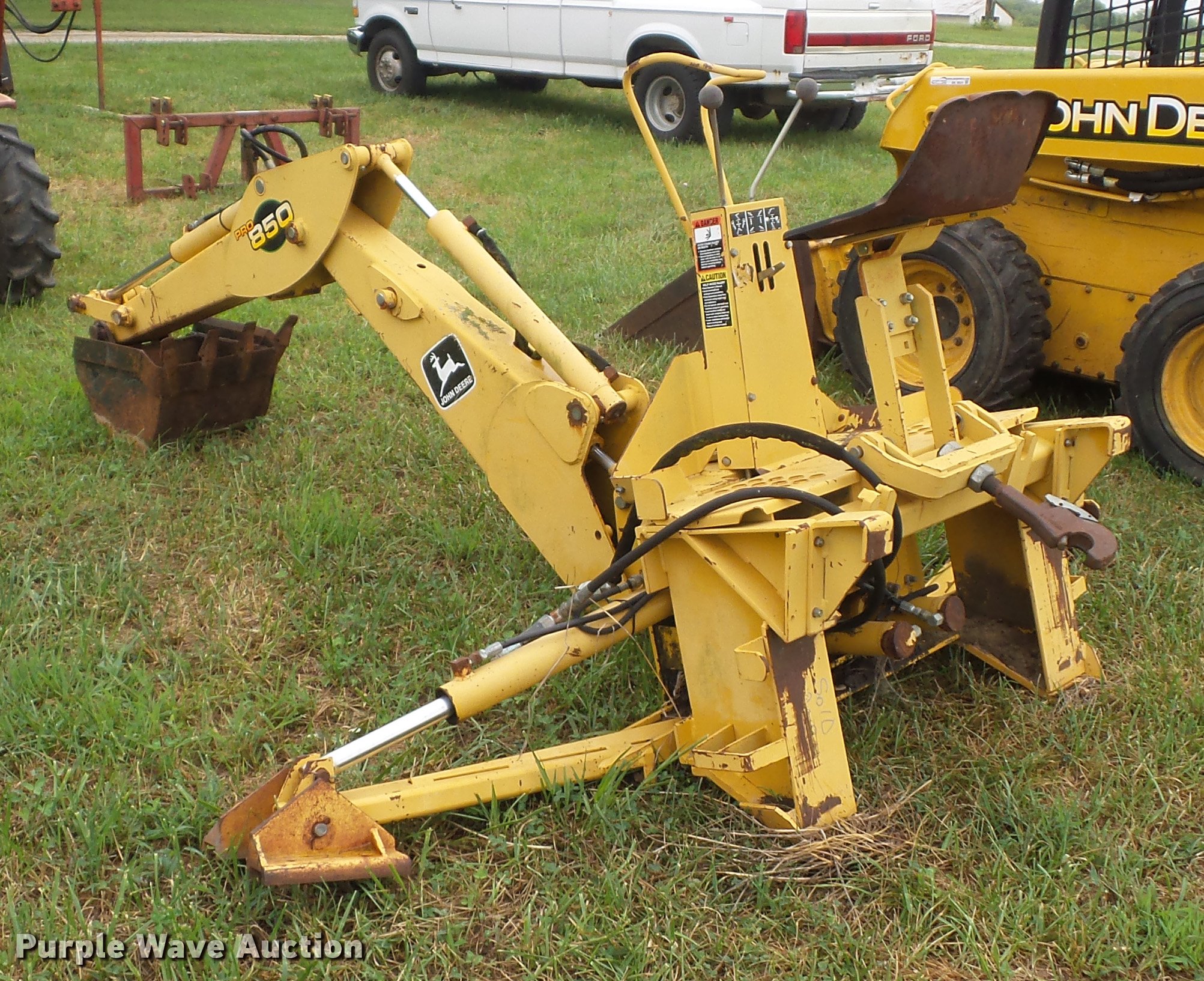 John Deere Pro 850 skid steer backhoe in Leeton, MO Item BK9625 sold
