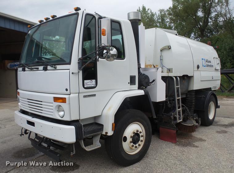 image for item K3525 2002 Sterling SC8000 Cargo Allianz Johnston street sweeper truck