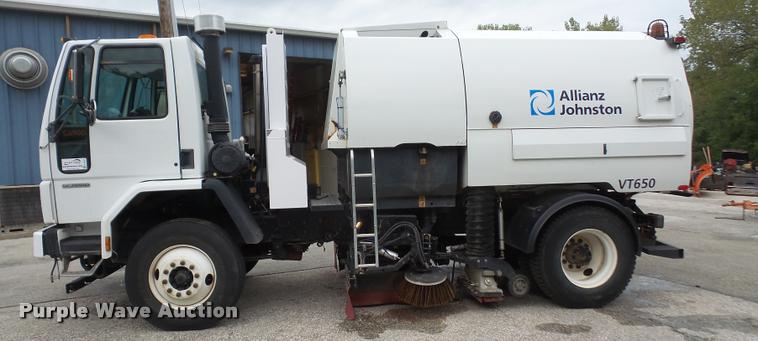 image for item K3525 2002 Sterling SC8000 Cargo Allianz Johnston street sweeper truck
