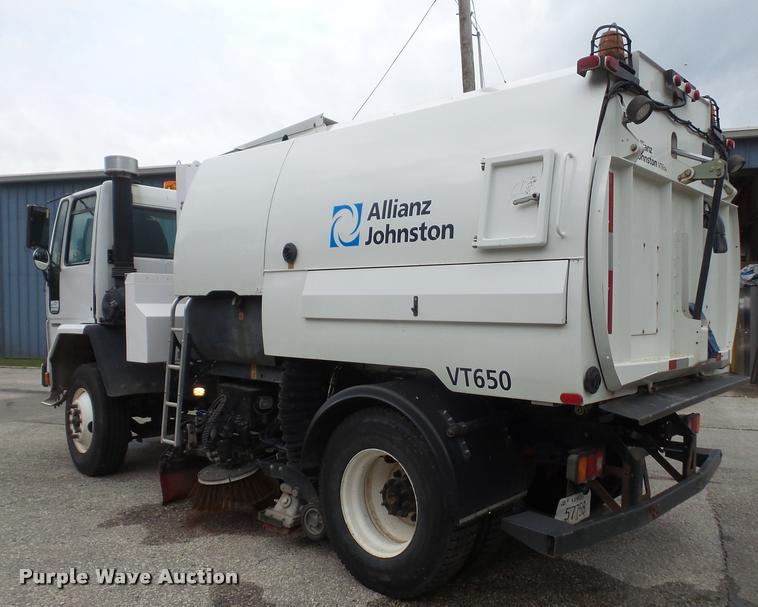 image for item K3525 2002 Sterling SC8000 Cargo Allianz Johnston street sweeper truck