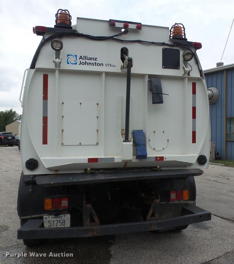 image for item K3525 2002 Sterling SC8000 Cargo Allianz Johnston street sweeper truck