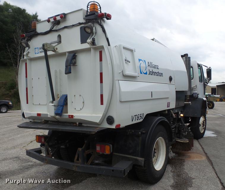 image for item K3525 2002 Sterling SC8000 Cargo Allianz Johnston street sweeper truck
