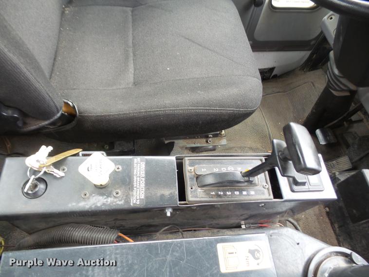 image for item K3525 2002 Sterling SC8000 Cargo Allianz Johnston street sweeper truck