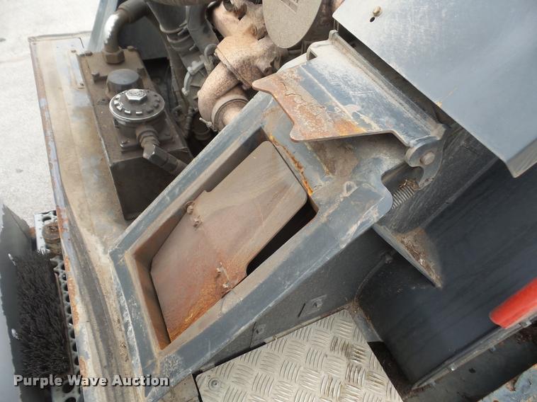 image for item K3525 2002 Sterling SC8000 Cargo Allianz Johnston street sweeper truck