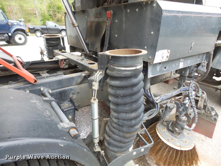 image for item K3525 2002 Sterling SC8000 Cargo Allianz Johnston street sweeper truck