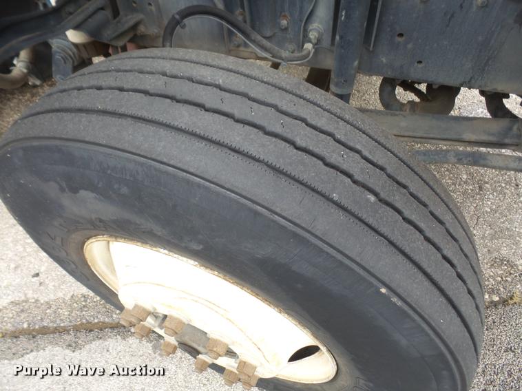 image for item K3525 2002 Sterling SC8000 Cargo Allianz Johnston street sweeper truck