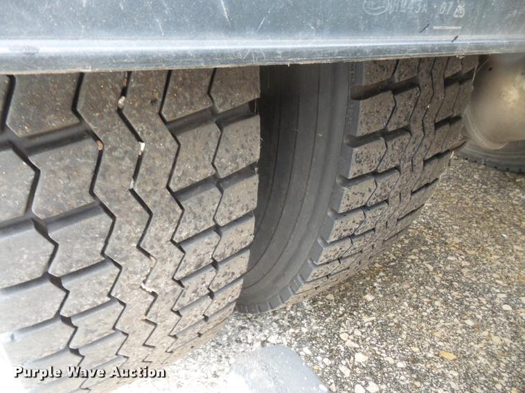 image for item K3525 2002 Sterling SC8000 Cargo Allianz Johnston street sweeper truck