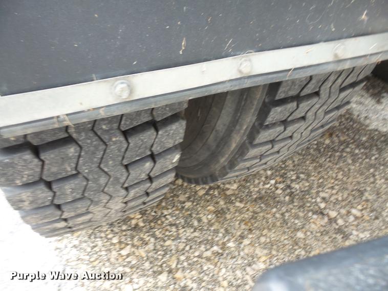 image for item K3525 2002 Sterling SC8000 Cargo Allianz Johnston street sweeper truck