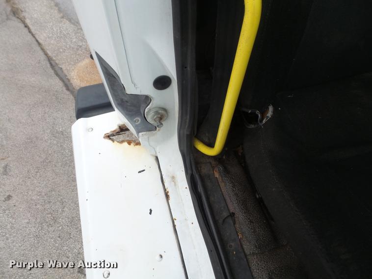 image for item K3525 2002 Sterling SC8000 Cargo Allianz Johnston street sweeper truck