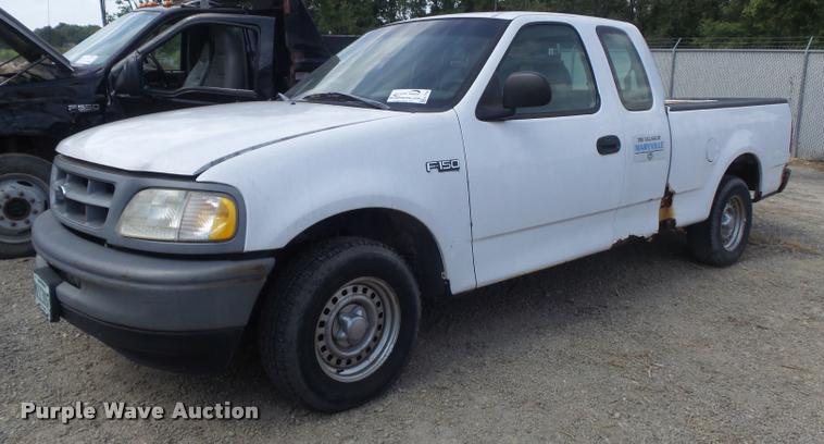 image for item K7726 1998 Ford F150 SuperCab pickup truck