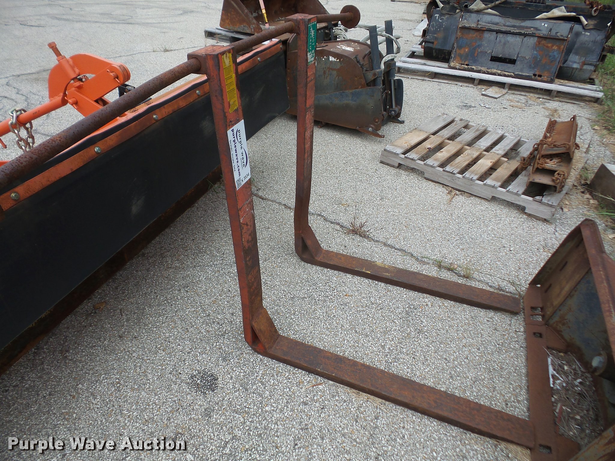 Backhoe pallet forks in Lenexa, KS Item K3534 sold Purple Wave