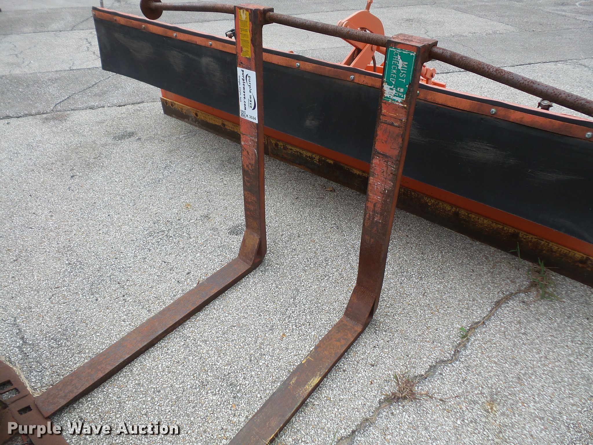 Backhoe pallet forks in Lenexa, KS Item K3534 sold Purple Wave