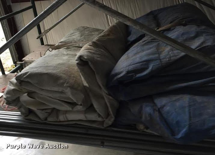 image for item F1094 (7) hay tarps with tie downs