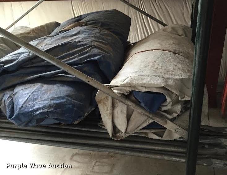 image for item F1094 (7) hay tarps with tie downs