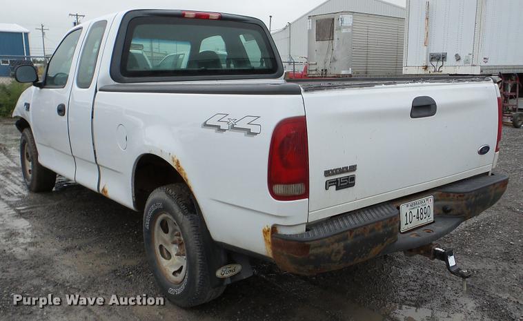 image for item DA8842 2004 Ford F150 SuperCab pickup truck
