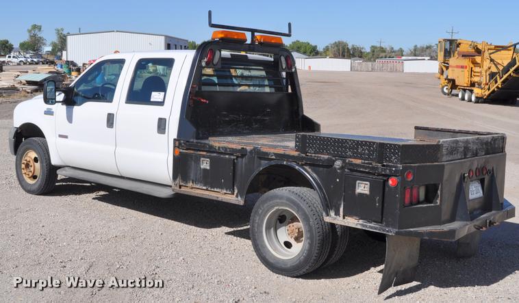 image for item G7484 2005 Ford F350 Super Duty Crew Cab flatbed pickup truck