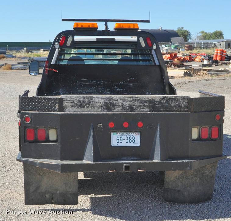 image for item G7484 2005 Ford F350 Super Duty Crew Cab flatbed pickup truck