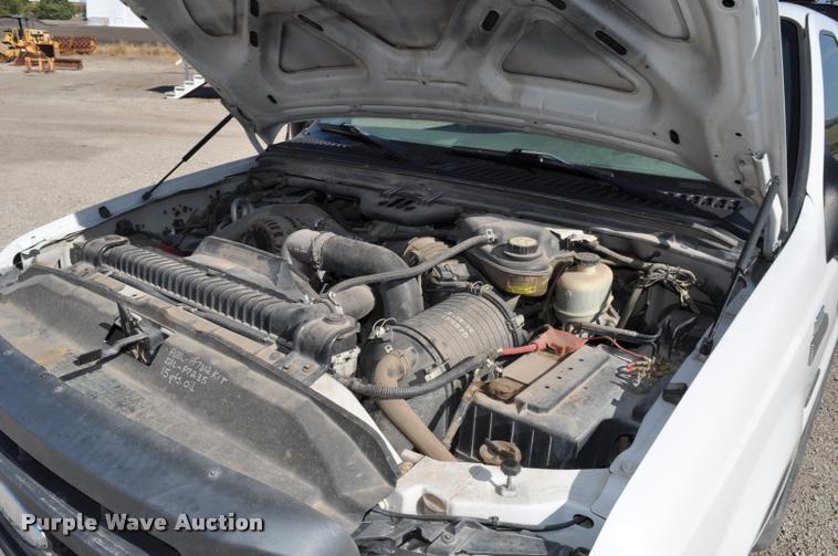 image for item G7484 2005 Ford F350 Super Duty Crew Cab flatbed pickup truck