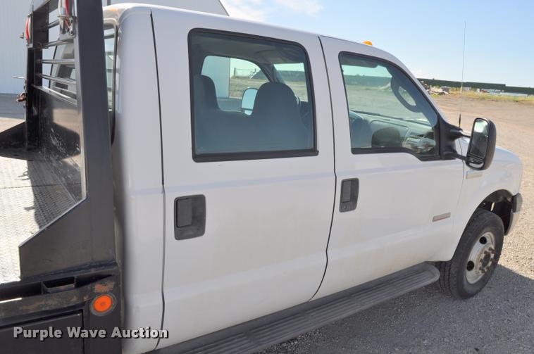 image for item G7484 2005 Ford F350 Super Duty Crew Cab flatbed pickup truck