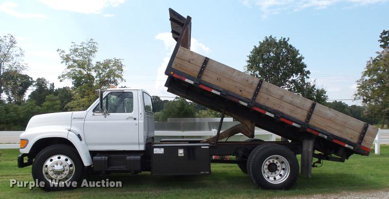 image for item K1128 1999 Ford F800 dump flatbed truck