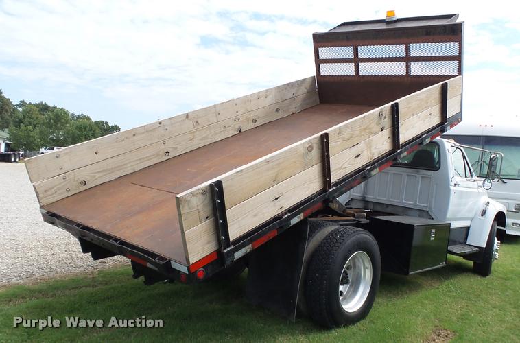 image for item K1128 1999 Ford F800 dump flatbed truck
