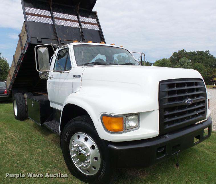 image for item K1128 1999 Ford F800 dump flatbed truck