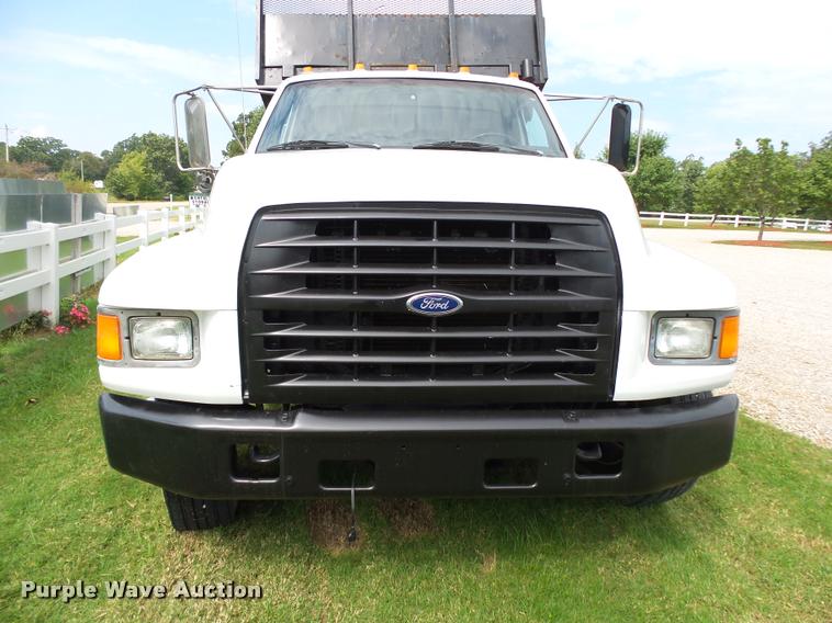 image for item K1128 1999 Ford F800 dump flatbed truck