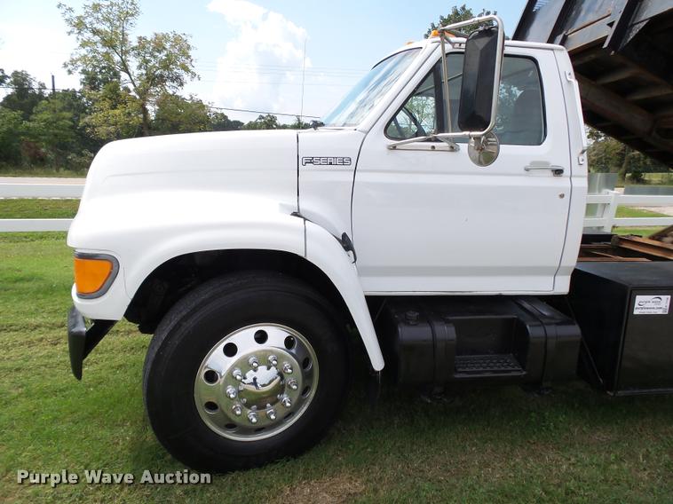image for item K1128 1999 Ford F800 dump flatbed truck